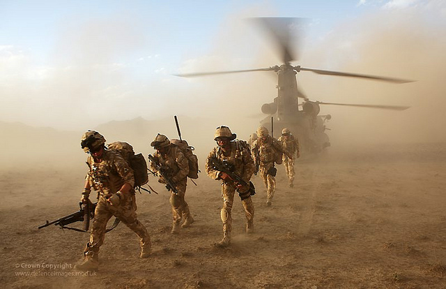 Soldiers from 3 Scots Deploy from a Chinook Helicopter in Afghanistan